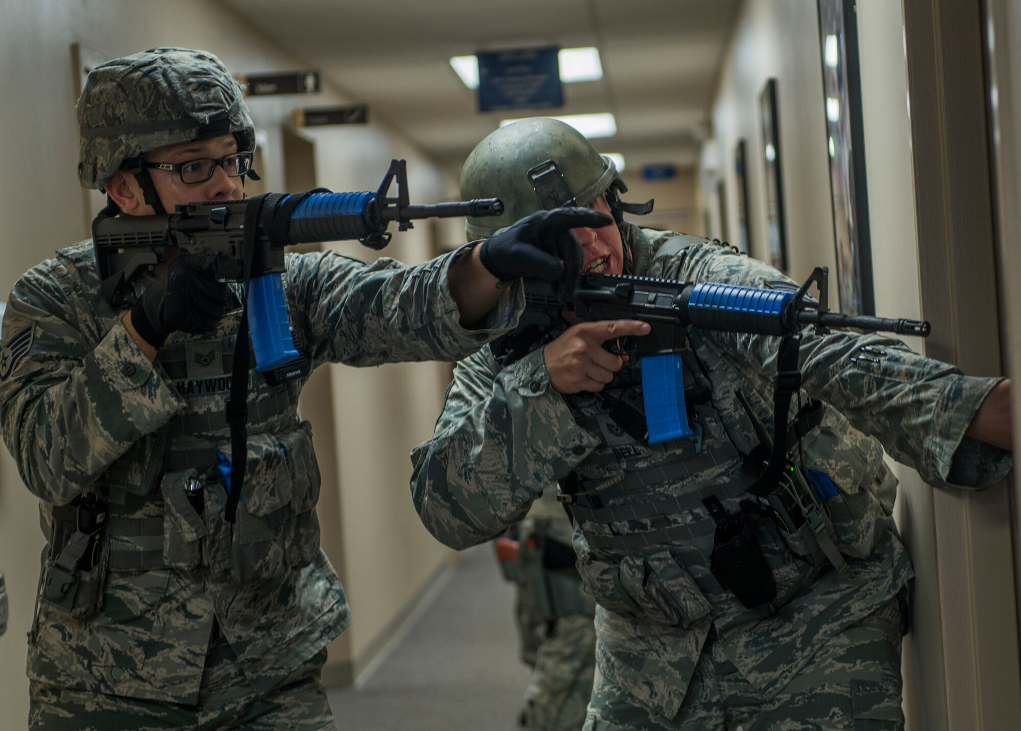 Staff Sgt. David Haywood and Tech. Sgt. Bryan Dell clear the final room of the building, Scott Air Force Base, Ill., Sept. 9, 2016.  . If ever in an active shooter situation, the Department of Homeland Security suggests the “avoid, deny, and defend” technique. The first is to avoid contact by running or removing oneself from the situation. The second is to deny access by barricading or locking doors. The final action should be to defend or fight back. (U.S. Air Force photo by Staff Sgt. Jodi Martinez)