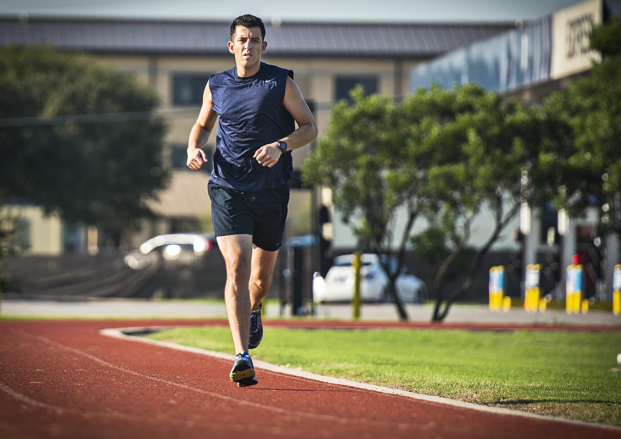 Master Sgt. Tito Carrillo, 433rd Aeromedical Evacuation Squadron flight medic, paces himself as he begins a two-mile speed run Sept. 1, 2016 at Joint Base San Antonio-Lackland, Texas. Carrillo was selected to run on the 2016 Air Force Reserve Command's Challenge Team. The team is comprised of ten marathon runners who will compete with other Air Force major commands in the half and full marathon at the 20th annual Air Force Marathon Sept. 17, 2016 at Wright-Patterson Air Force Base, Ohio.  (U.S. Air Force photo by Benjamin Faske)