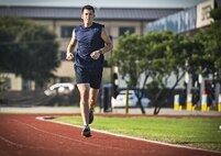 Master Sgt. Tito Carrillo, 433rd Aeromedical Evacuation Squadron flight medic, paces himself as he begins a two-mile speed run Sept. 1, 2016 at Joint Base San Antonio-Lackland, Texas. Carrillo was selected to run on the 2016 Air Force Reserve Command's Challenge Team. The team is comprised of ten marathon runners who will compete with other Air Force major commands in the half and full marathon at the 20th annual Air Force Marathon Sept. 17, 2016 at Wright-Patterson Air Force Base, Ohio.  (U.S. Air Force photo by Benjamin Faske)