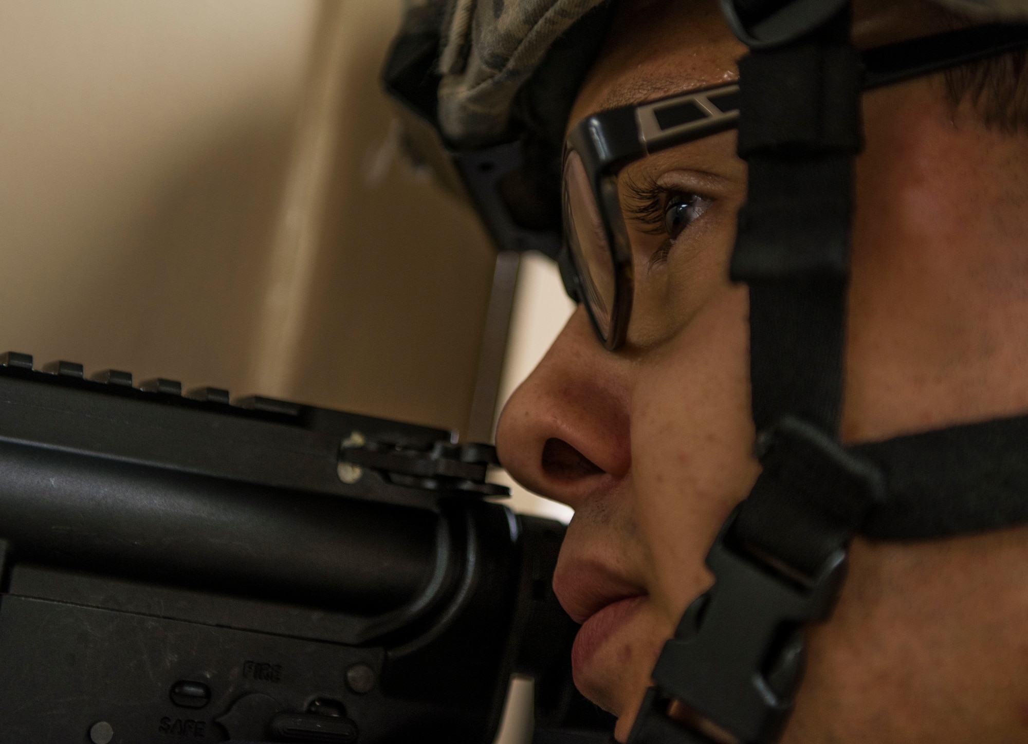 Staff Sgt. David Haywood, 375th Security Forces Squadron, looks ahead as he keeps guard during an active shooter exercise, Scott Air Force Base, Ill., Sept. 9, 2016.  With an increase of mass shootings, the Department of Defense has trained personnel and first responders on how to respond in an active shooter situation.