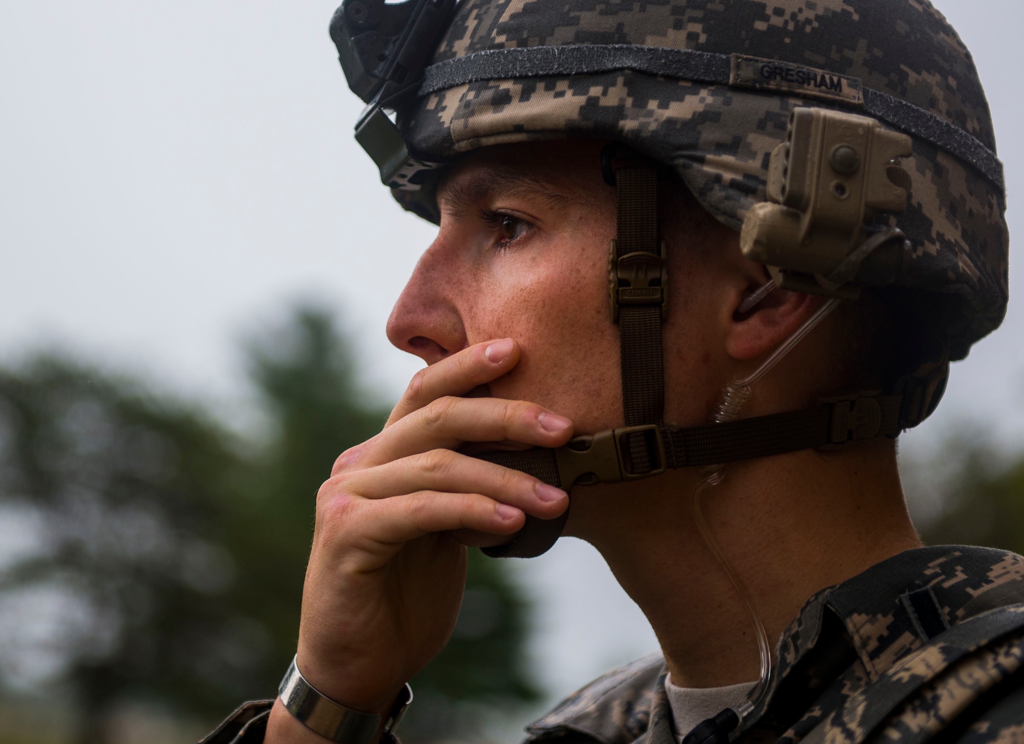 1st Lt. Christopher Gresham, 375th Security Forces Squadron, wipes his face as he learns that additional rooms may have people in them during an active shooter exercise, Scott Air Force Base, Ill., Sept. 9, 2016.  With an increase of mass shootings, the Department of Defense has trained personnel and first responders on how to respond in an active shooter situation.