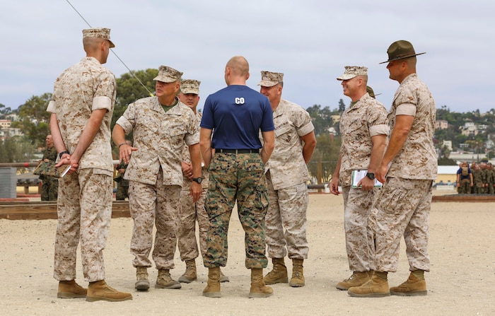 General Robert B. Neller, Commandant of the Marine Corps, observes the confidence course at Marine Corps Recruit Depot San Diego, Sept. 12. Neller talked to Brig. Gen. William M. Jurney, commanding general, MCRD San Diego/Western Recruiting Region, and Sgt. Maj. Alex M. Dobson, MCRD San Diego/WRR, and was given a small tour.