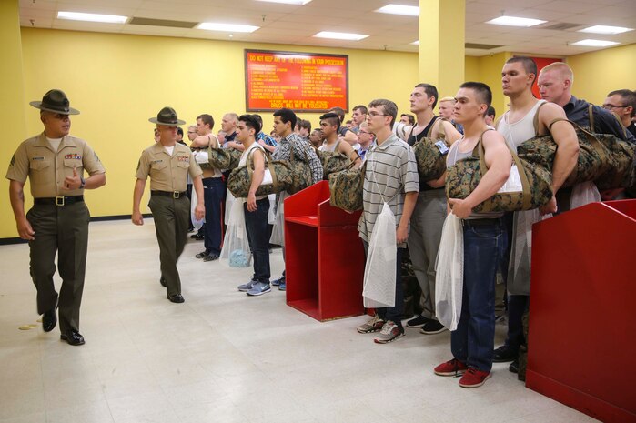 Sergeant David Alvarado, Receiving Company, Support Battalion, instructs recruits during receiving at Marine Corps Recruit Depot San Diego, Sept. 12. From this point on, recruits will eat, sleep and train as a team as they begin the transformation from civilian to Marine. Annually, more than 17,000 males recruited from the Western Recruiting Region are trained at MCRD San Diego. Golf Company is scheduled to graduate Dec. 9.