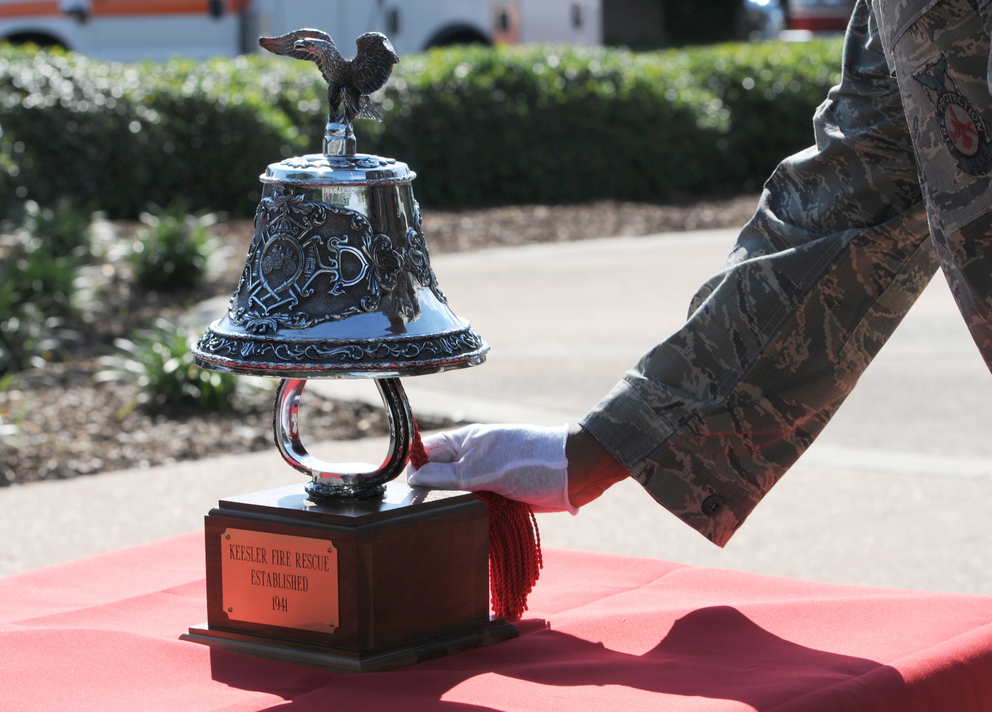 Staff Sgt. Anthony Marshall, 81st Infrastructure Division firefighter, conducts a last alarm tribute during a 9/11 memorial retreat ceremony, Sept. 12, 2016, on Keesler Air Force Base, Miss. Fifteen years ago on Sept. 11, 2001, 19 terrorists simultaneously hijacked four passenger jets; flying one into the Pentagon and two into the World Trade Center in New York City, N.Y., and one crashing outside of Shanksville, Pa. A total of 2,996 people were killed in the attacks. (U.S. Air Force photo by Kemberly Groue/Released)