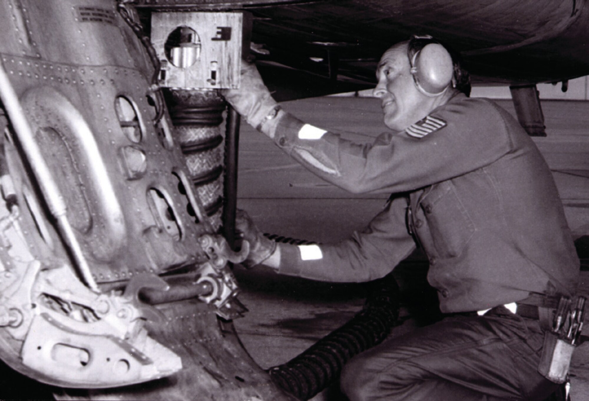 188th Tactical Fighter Group Airman provides maintenance to an F-100 “Super Sabre” during Bold Eagle in 1976. (Courtesy photo)