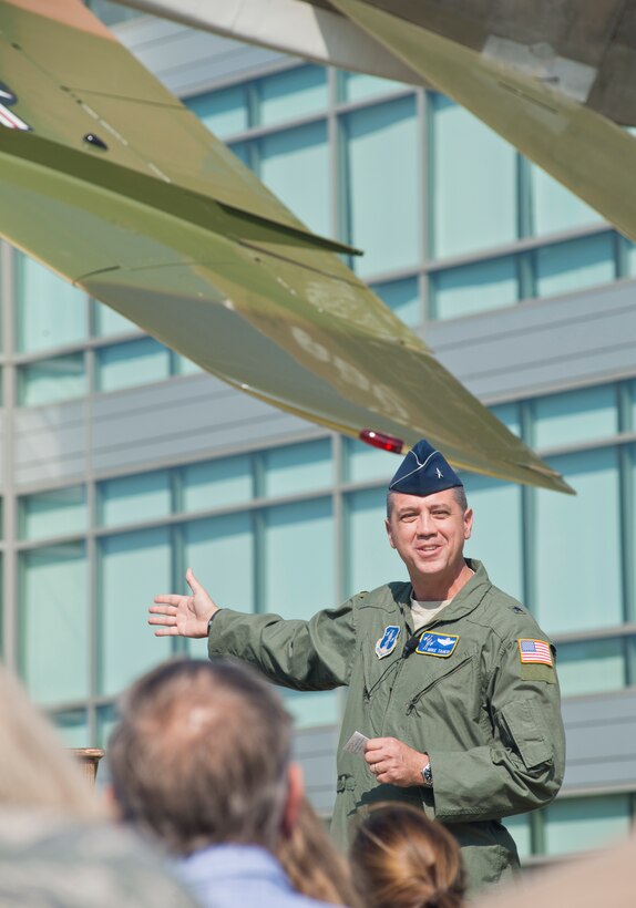 Brig. Gen. Michael R. Taheri, Air National Guard Readiness Center commander, delivers remarks at a dedication ceremony for an F-100 Super Sabre static display at the ANGRC on Joint Base Andrews, Md., September 13, 2016. Taheri thanked the many Airmen and units across the Guard whose efforts made the monument possible. (U.S. Air National Guard photo by Staff Sgt. John E. Hillier)