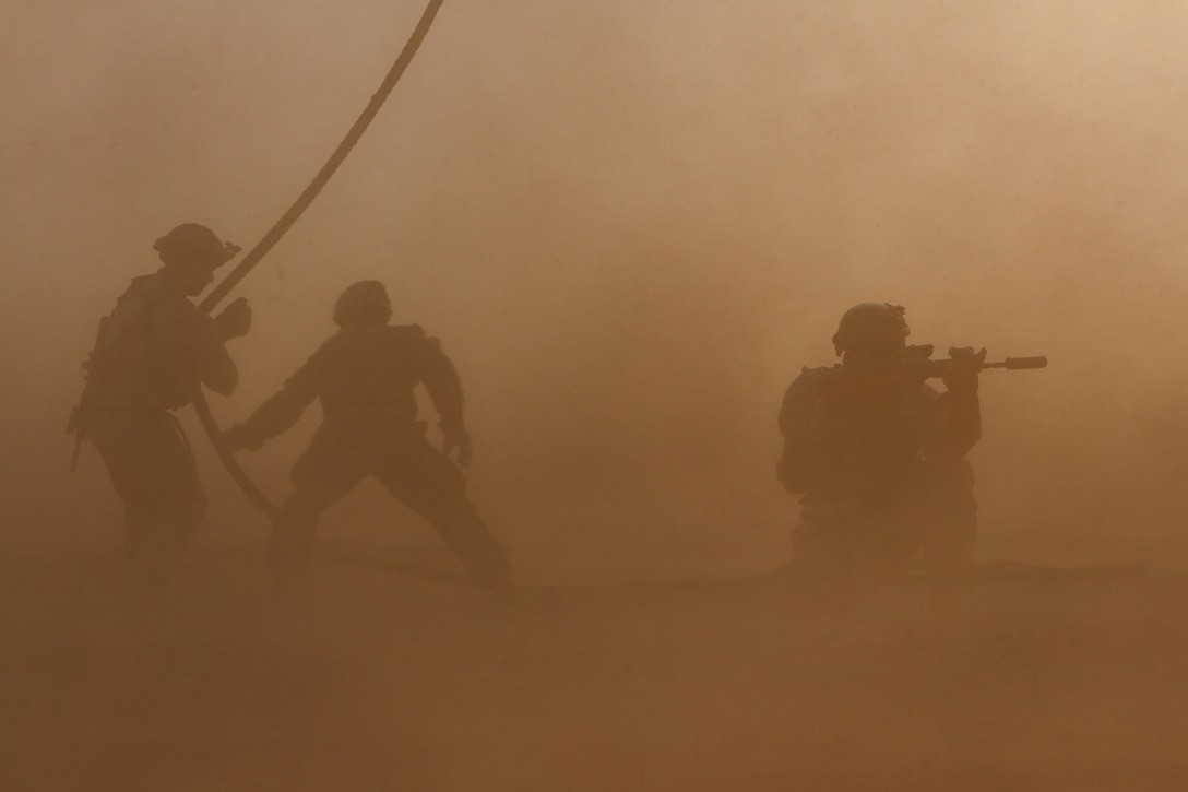 A U.S. Force Recon Marine provides security for his teammates July 21, 2016 after running through a fast rope drill during Chilean exercise Southern Star held in Antofagasta, Chile. (U.S. Army Photo by Staff Sgt. Osvaldo Equite/Released)
