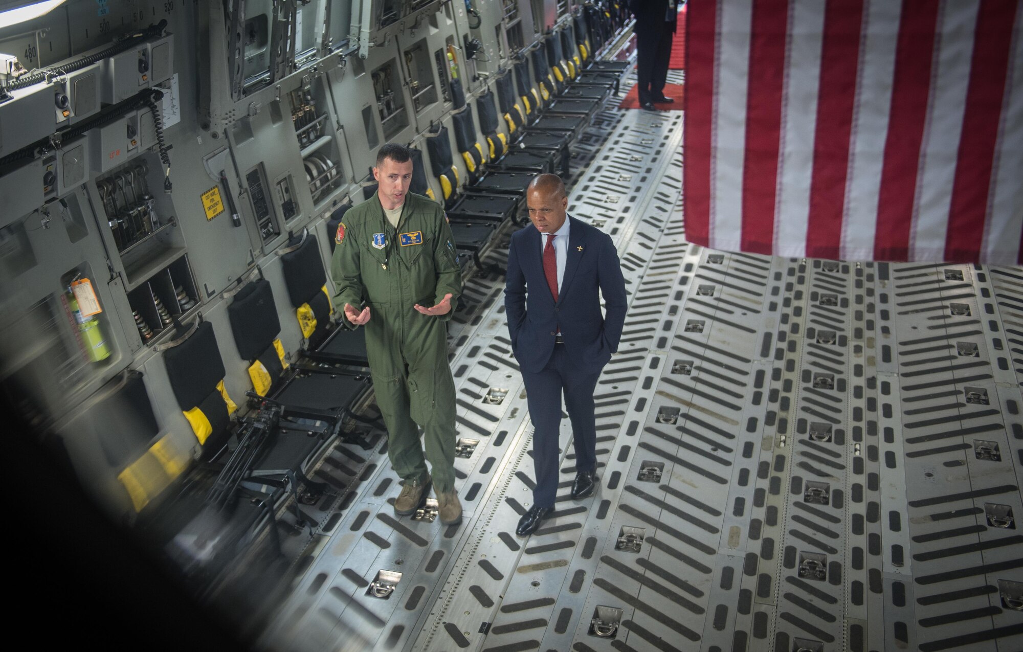 U.S. Ambassador to South Africa Patrick H. Gaspard speaks to Tech. Sgt. Ken Martini from the 105th Airlift Wing, Stewart Air National Guard Base, at the African Aerospace and Defense Expo at Waterkloof Air Force Base, South Africa, Sept. 14, 2016. The U.S. military is exhibiting a C-17 Globemaster III, a KC-135 Stratotanker, a C-130J Super Hercules, an HC-130 King, and an MQ-9 Reaper. The aircraft come from various Air National Guard and Air Force Reserve Command units. The U.S. routinely participates in events like AADE to strengthen partnerships with regional partners. (U.S. Air Force photo by Tech. Sgt. Ryan Crane)