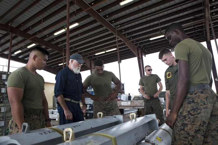 U.S. Aviation Ordnance Marines with Marine Aviation Logistics Squadron12 prepare ordnance for aviation squadrons participating in Valiant Shield 16 at Andersen Air Force Base, Guam, September 12, 2016. The ordnance constructed, provided the Marines of MALS-12 valuable experience assembling live ordnance to be used  during VS16 for a ship sinking exercise. VS16 is a biennial U.S. only, field training exercise that focuses on joint training with U.S. Navy, Air Force and Marine Corps to increase interoperability and working relationships. (U.S. Marine Corps photo by Sgt. Justin A. Fisher)