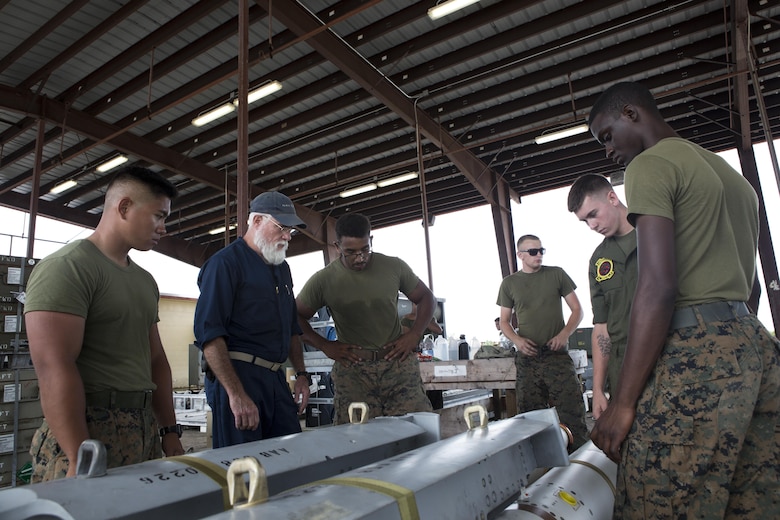 U.S. Aviation Ordnance Marines with Marine Aviation Logistics Squadron12 prepare ordnance for aviation squadrons participating in Valiant Shield 16 at Andersen Air Force Base, Guam, September 12, 2016. The ordnance constructed, provided the Marines of MALS-12 valuable experience assembling live ordnance to be used  during VS16 for a ship sinking exercise. VS16 is a biennial U.S. only, field training exercise that focuses on joint training with U.S. Navy, Air Force and Marine Corps to increase interoperability and working relationships. (U.S. Marine Corps photo by Sgt. Justin A. Fisher)