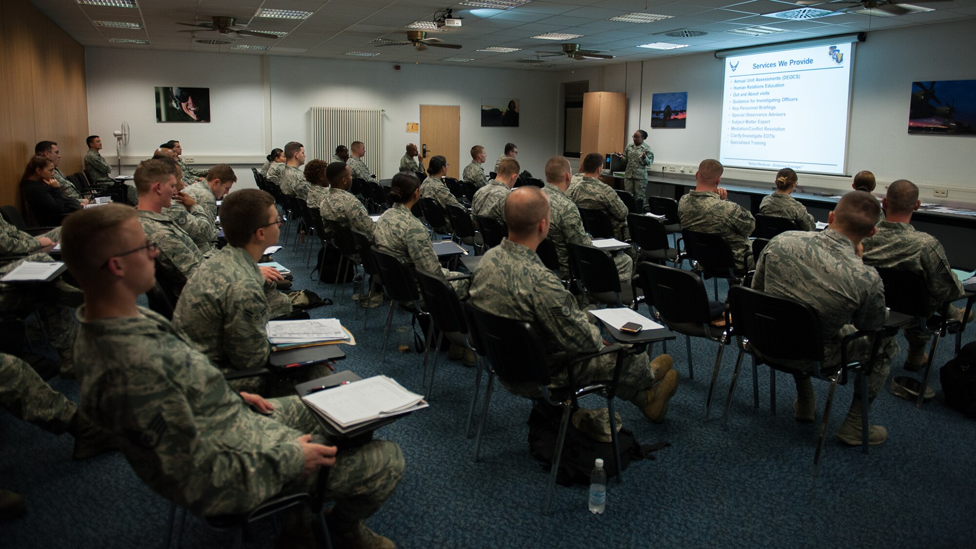 Ramstein Inprocessing Line participants attend an equal opportunity briefing Sept. 6, 2016, at Ramstein Air Base, Germany. When Airmen first arrive at Ramstein, they go through RIPLINE to learn about the different services that are available to them, including EO. During this briefing, Tech. Sgt. Lakeisha Jones, 86th Airlift Wing Equal Opportunity advisor, briefed the class on reporting complaints. (U.S. Air Force photo/Airman 1st Class Savannah L. Waters)