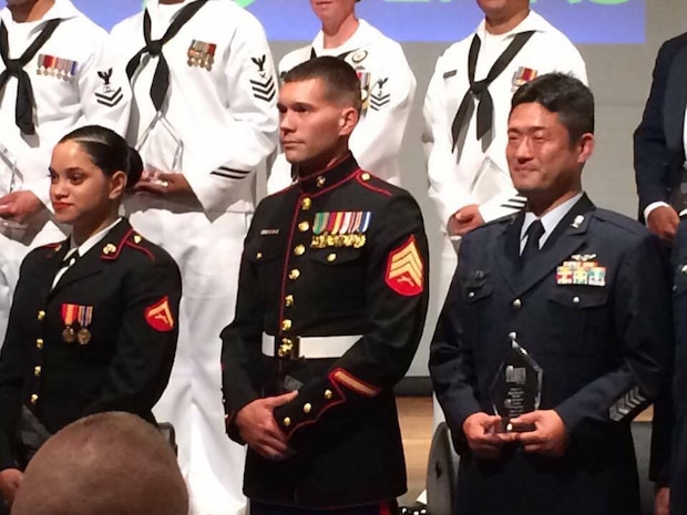 U.S. Marine Corps Sgt. Johnathan M. Cobb, patrol supervisor for the Provost Marshal’s Office at Marine Corps Air Station Iwakuni, participates in an award ceremony at the USO Japan Ninth Annual Service Salute Gala in Tokyo, Japan, Aug. 27, 2016. Cobb exceeded all criteria and represented MCAS Iwakuni at the Service Salute Gala as the air station’s Marine of the year.