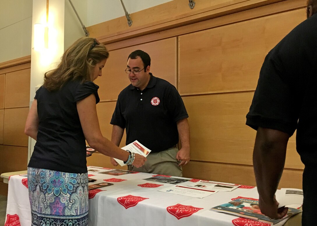 Employees at NSA Philadelphia receive information from a Salvation Army Emergency Disaster Services representative during DLA Troop Support's annual National Preparedness Month event Sept. 8. The event also featured representatives from the Federal Emergency Management Agency, the Pennsylvania Emergency Management Agency and the Red Paw Emergency Relief Team.