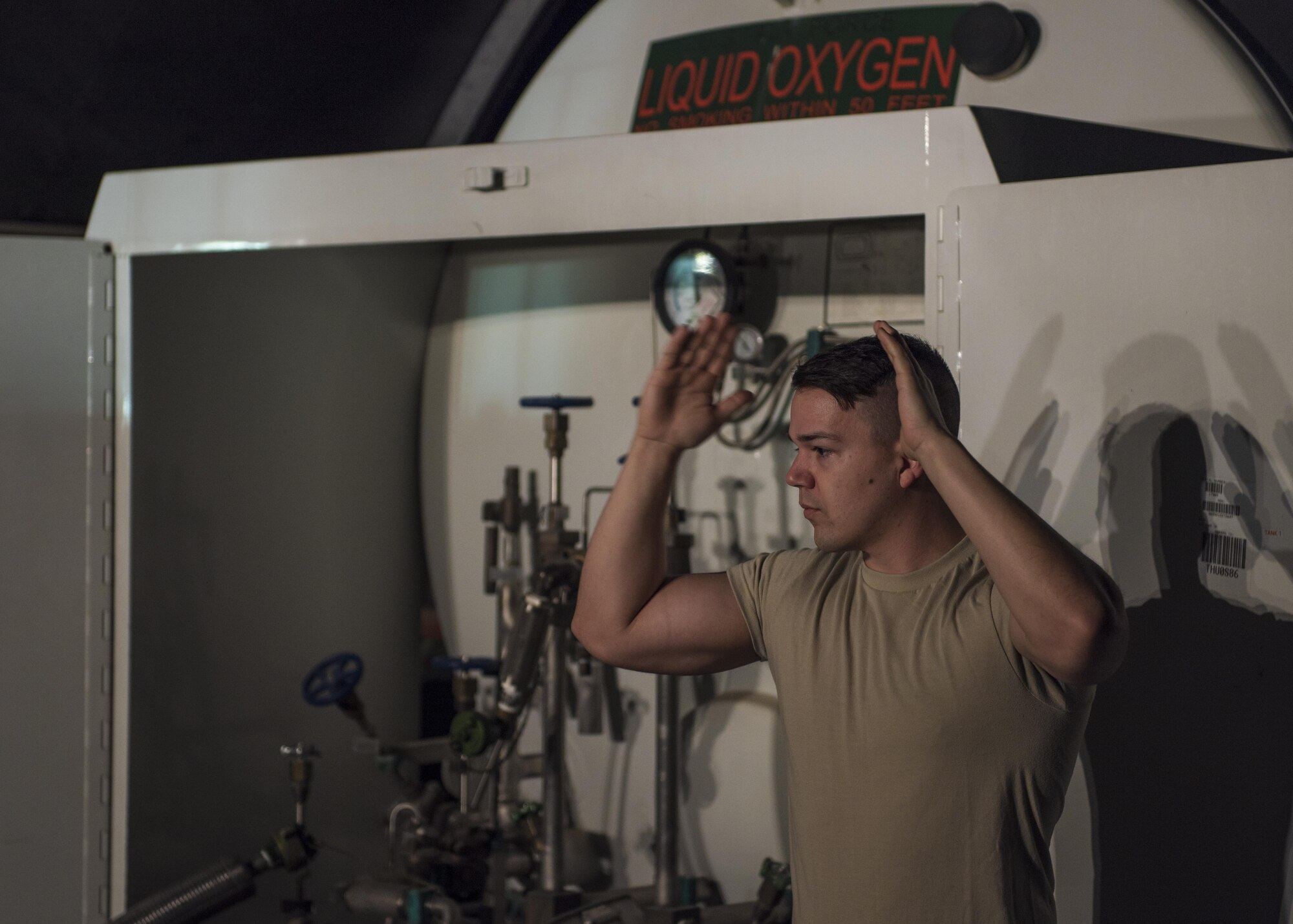 Tech. Sgt. Corey Briggs, 455th Expeditionary Logistics Readiness Squadron cryogenics, guides a 10k forklift, Bagram Airfield, Afghanistan, Sept. 14, 2016. The 455th ELRS received 400-gallon liquid oxygen tanks from the 379th ELRS at Al Udeid Air Base, Qatar, which ships liquid oxygen and liquid hydrogen daily to other bases throughout the U.S. Air Forces Central Command’s area of responsibility. The oxygen goes through a series of tests before being used in aircraft. (U.S. Air Force photo by Senior Airman Justyn M. Freeman)