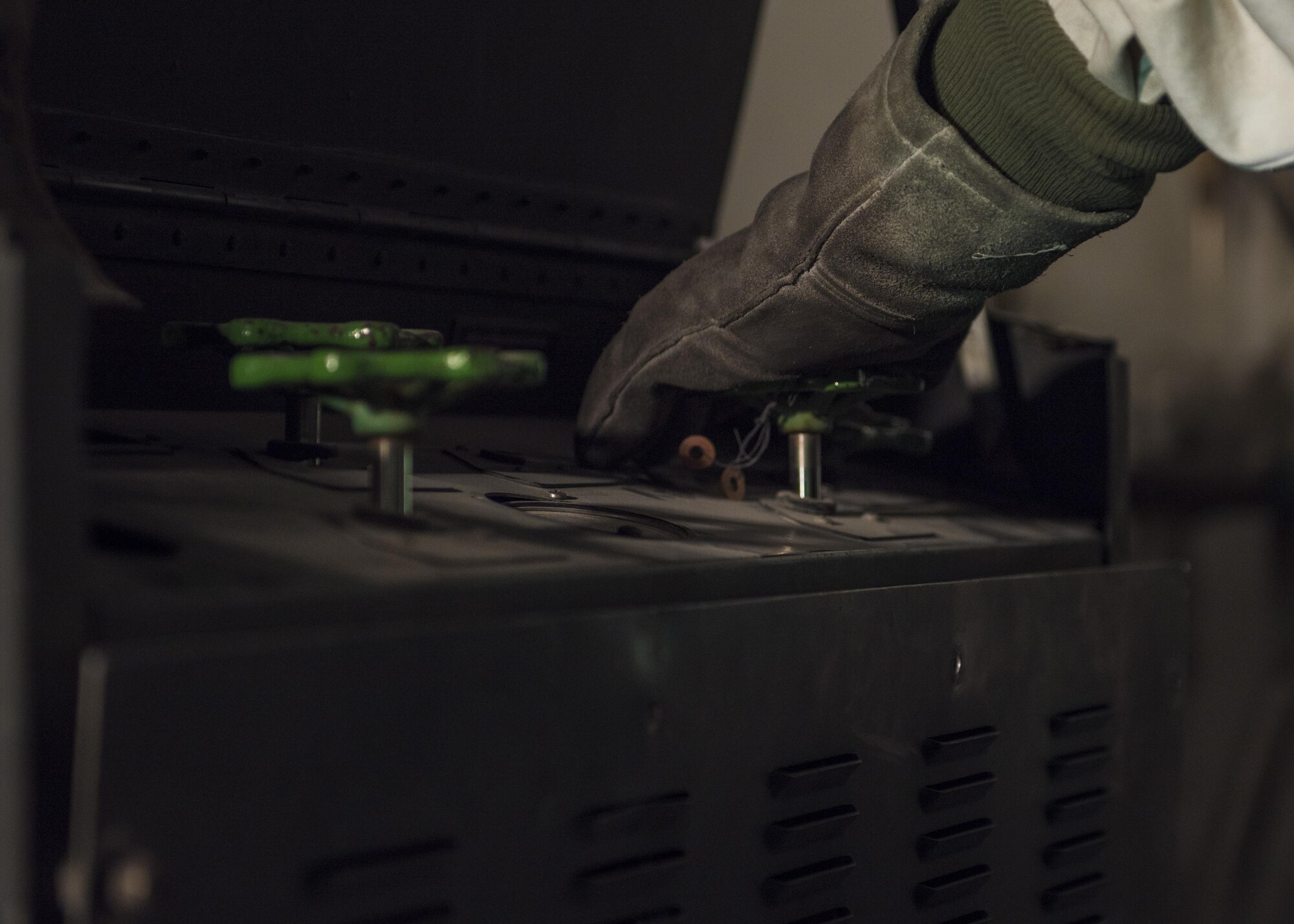Staff Sgt. Nathan Knight, 455th Expeditionary Logistics Readiness Squadron cryogenics supervisor, opens a valve on a 400-gallon liquid oxygen tank, Bagram Airfield, Afghanistan, Sept. 14, 2016. Cryogenics Airmen work with liquid nitrogen and liquid oxygen that is stored into aircraft, providing aircrews with pure oxygen at altitude during missions in support of Operation Freedom’s Sentinel. (U.S. Air Force photo by Senior Airman Justyn M. Freeman)
