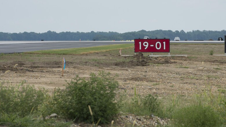 An airfield sign marking Runway 01-19 sits at its intersection with Runway 14-32 Sept. 1, 2016, on Dover Air Force Base, Del. Runway 01-19 is expected to open for operation Sept. 23, 2016. (U.S. Air Force photo by Senior Airman Zachary Cacicia)