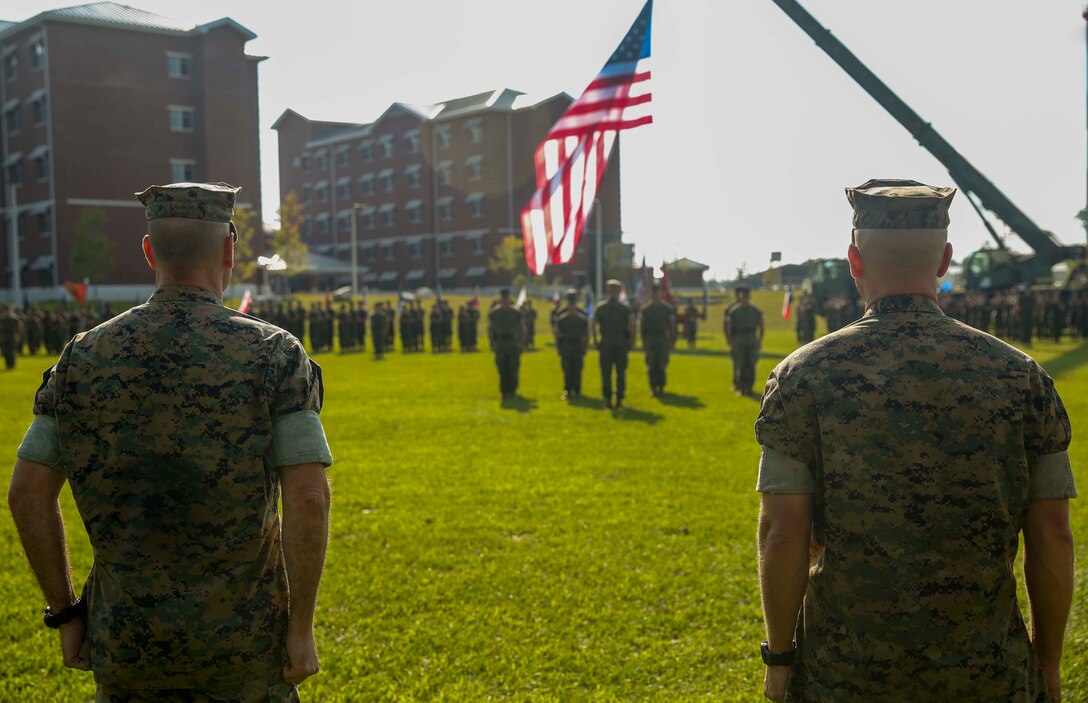 Col. Scott A. Baldwin, right, Marine Corps Engineer School outgoing commanding officer, stands with Col. Daniel P. O’Hora, left, Marine Corps Engineer School incoming commanding officer, at the end of the change of the command ceremony at Courthouse Bay on Marine Corps Base Camp Lejeune, Sept 9. The mission of the Marine Corps Engineer School is to ingrain at the entry and supervisory level the skills needed for engineers to be prepared for the operating forces.