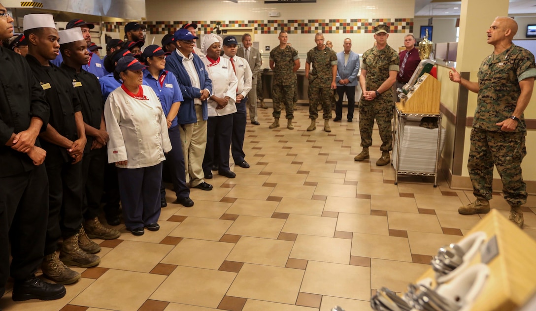 Col. Thomas Bruno, Marine Corps Installation East – Marine Corps Base Camp Lejeune Chief of Staff, speaks to the staff of Mess Hall Wallace Creek 100 about the Certificate of Commendation the staff earned for their service on Marine Corps Base Camp Lejeune, Sept. 8. The award is a prerequisite for the W.P.T. Hill Memorial Awards for Foodservice Excellence across the Marine Corps.