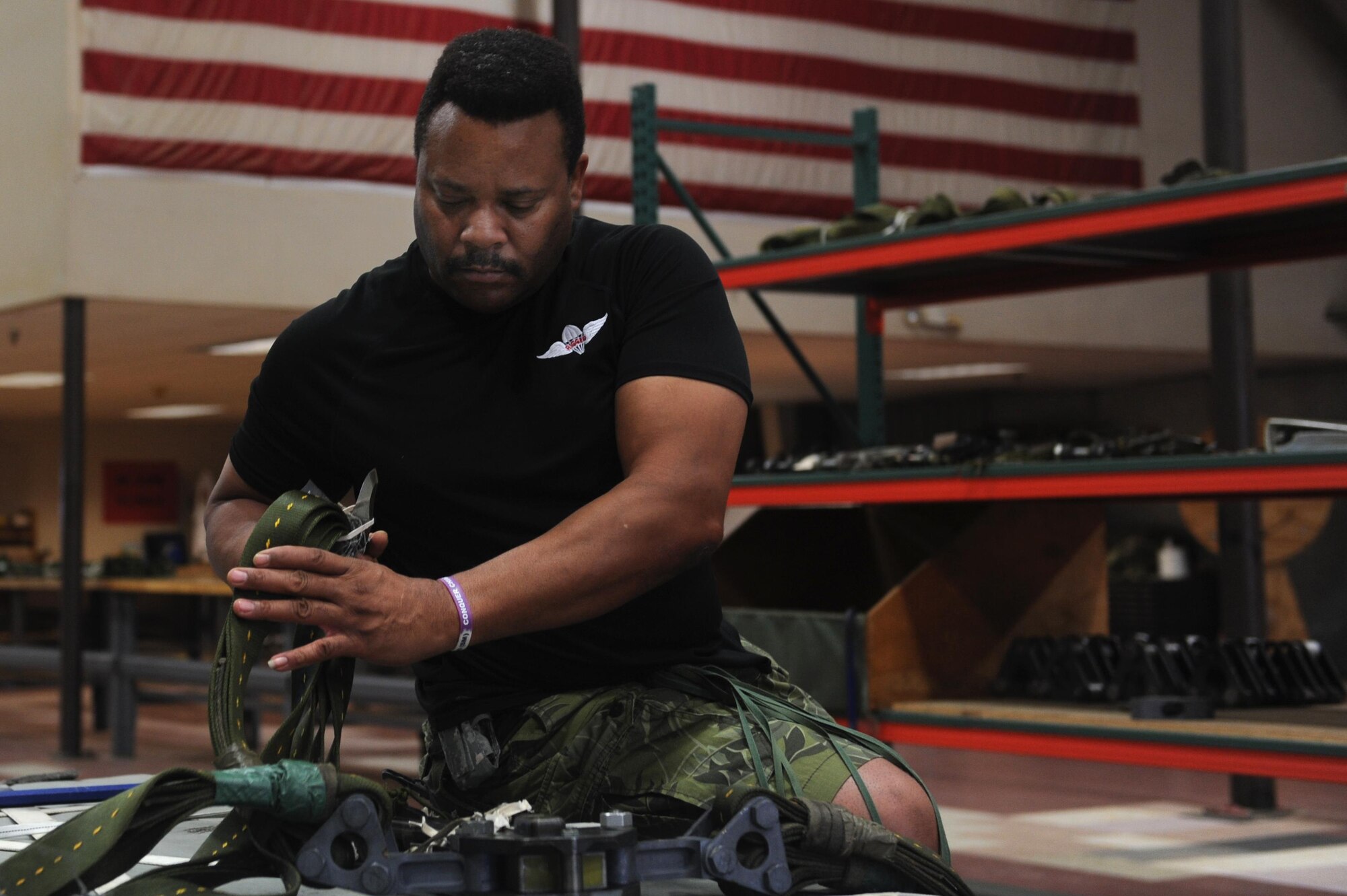 Levander McGinnis, 19th Logistics Readiness Squadron Aerial Delivery parachute rigger, reconstitutes a heavy equipment platform Sept. 9, 2016, at Hangar 259 on Little Rock Air Force Base, Ark. A team of 29 Airmen and 10 civilians are responsible for rigging, recovering and repairing cargo platforms. 