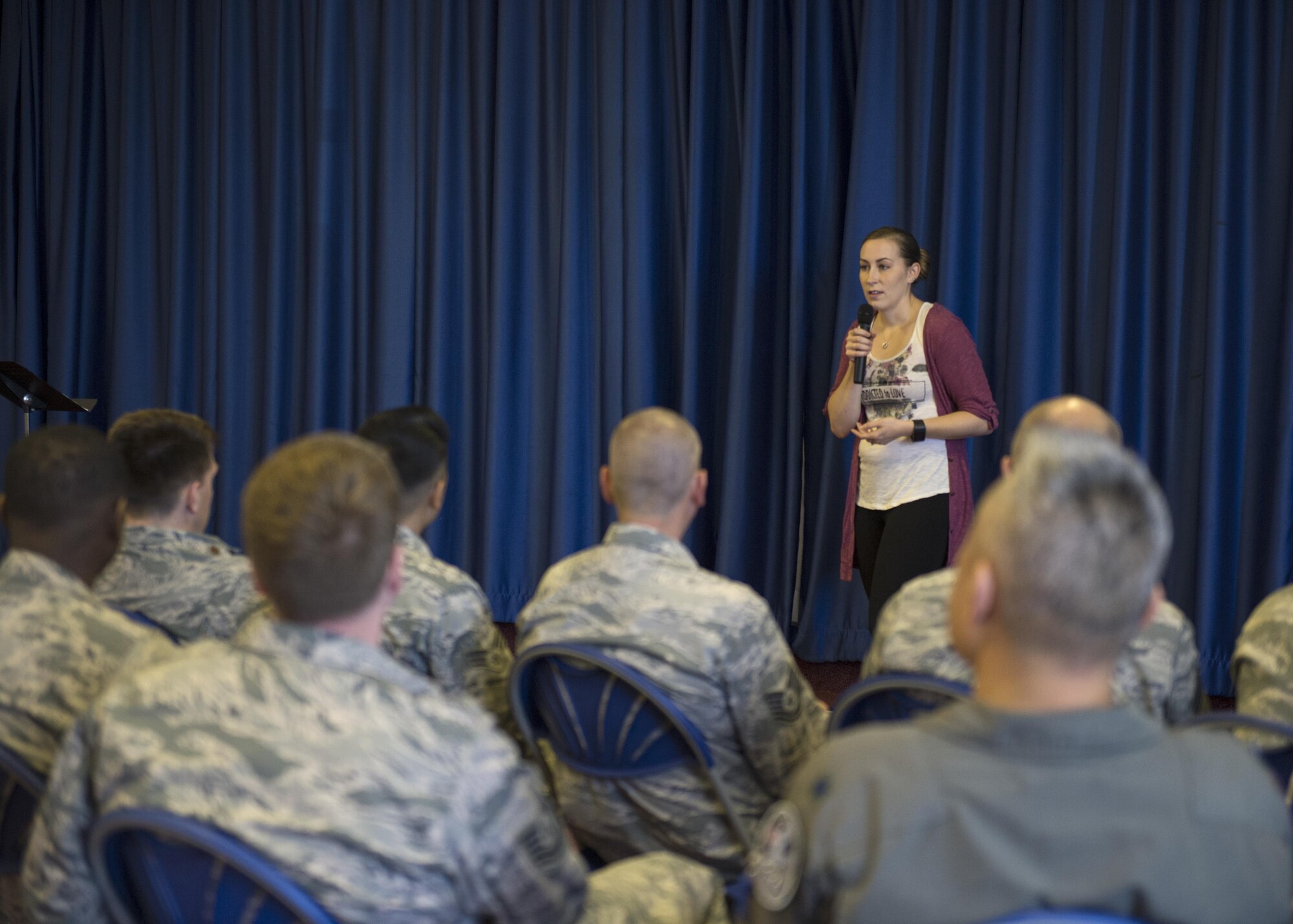 U.S. Air Force Staff Sgt. Julie Stich, 48th Medical Group radiology technician and Green Dot implementer, speaks to Airmen during a Green Dot general overview training at Royal Air Force Lakenheath, England, Sept. 9. The training revolves around teaching Airmen how to recognize, analyze and respond to an incident involving interpersonal violence. (U.S. Air Force photo/Senior Airman Malcolm Mayfield)