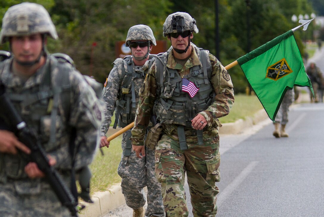 U.S. Army Reserve Soldiers from the 200th Military Police Command march on Fort Meade, Md., Sept. 11, 2016. Before starting the march, the unit conducted a moment of silence in honor of those lost during 9/11 and Soldiers shared their personal memories of the attacks. (U.S. Army Reserve photo by Spc. Stephanie Ramirez)