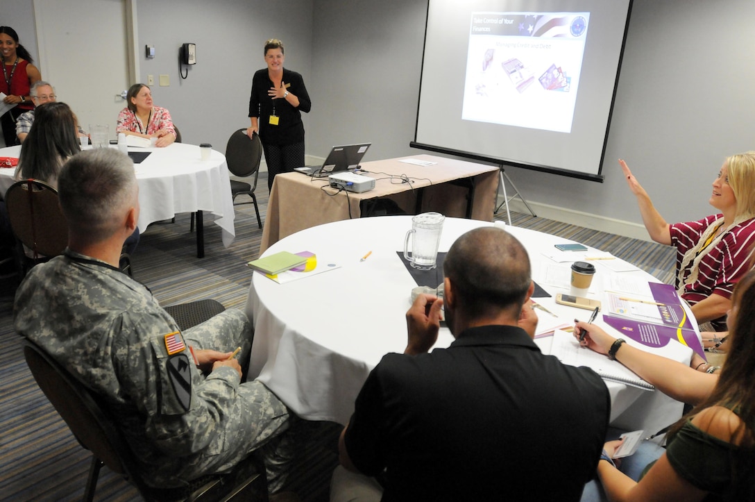 Susan Schroeder, a personal finance counselor with the 88th Regional Support Command-sponsored Yellow Ribbon, speaks to Soldiers and family members during a “Take Control of Your Finances” briefing during the Yellow Ribbon event at Minneapolis, Sept. 10. Schroeder helps family members and Soldiers prepare financially for a deployment as well how to manage personal finances after a deployment.