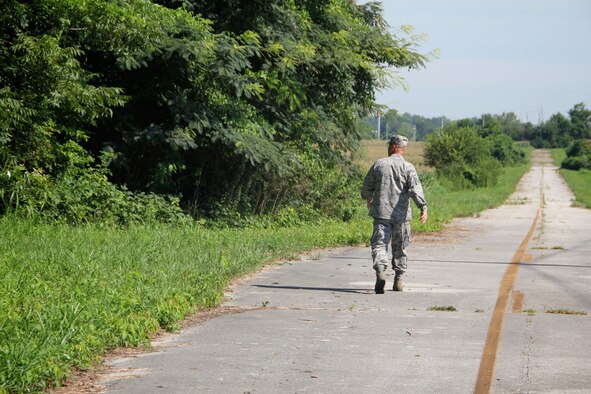 September brings solemn anniversary in 932nd Airlift Wing flying history.  Site of long forgotten fatal C-9A crash found by wing historian, Master Sgt. Gerald Sonnenberg.  Mid-September in southern Illinois is typically a mix of cool mornings and comfortably warm, sunny days as summer comes to a close and ushers in the beginning of fall. Farmers are busy harvesting the hundreds of square miles of corn fields surrounding Scott AFB, Illinois. It was one of those days 45 years ago on Sept. 16, 1971, when one of the Air Force's new C-9A Nightingales crashed just off base.  (U.S. Air Force photo by Maj. Stan Paregien)