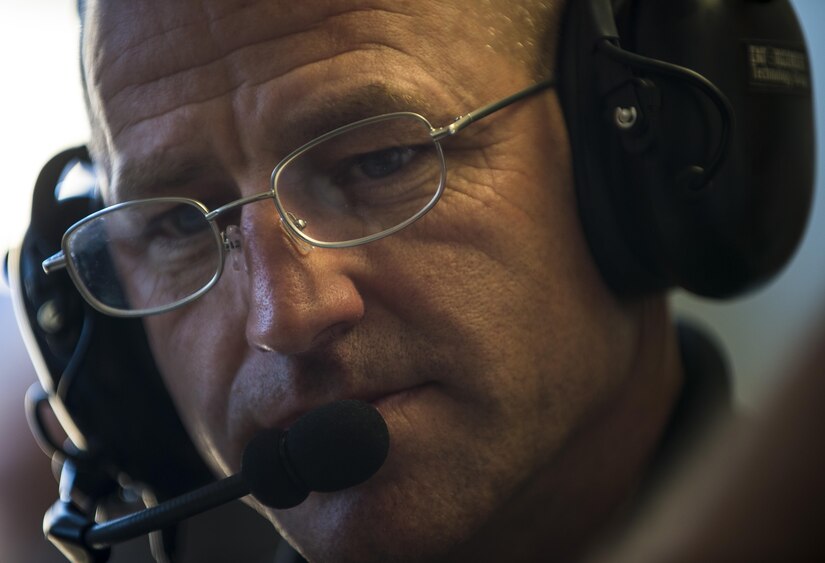 U.S. Army Reserve special agent Craig Powers, with the 383rd Military Police Detachment, Lakeland, Florida, talks with a hostage taker via headset during Capital Shield 2016 at Fort Belvoir, Virginia, Sept. 13. Approximately 15 U.S. Army Reserve criminal investigative special agents trained alongside 25 active duty agents for the first time in a joint training exercise known as Capital Shield, focusing on crime scene processing, evidence management and hostage negotiations, held Sept. 13-15. The reserve Soldiers participating in this year's Capital Shield are agents from the 733rd Military Police Battalion (Criminal Investigation Division), headquartered in Fort Gillem, Georgia, which reports to the 200th Military Police Command. The active duty agents belong to various offices across the Washington CID Battalion, headquartered at Fort Myer, Virginia. (U.S. Army Reserve photo by Master Sgt. Michel Sauret)