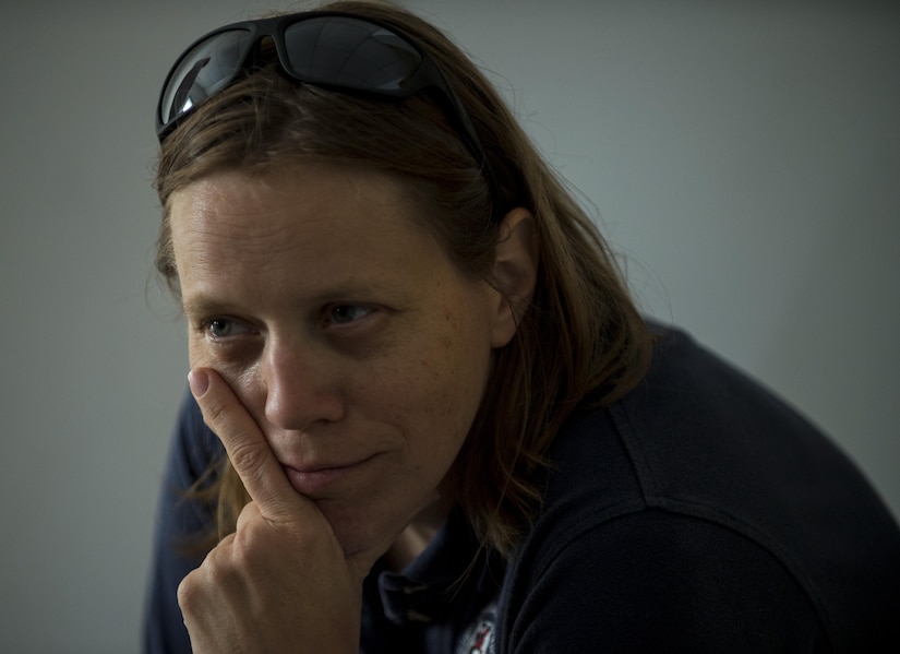 U.S. Army special agent Amy Sears, of the Aberdeen Proving Ground Criminal Investigation Division Office in Maryland, listens to a conversation about crime scene investigation during Capital Shield 2016 at Fort Belvoir, Virginia, Sept. 14. Approximately 15 U.S. Army Reserve criminal investigative special agents trained alongside 25 active duty agents for the first time in a joint training exercise known as Capital Shield, focusing on crime scene processing, evidence management and hostage negotiations, held Sept. 13-15. The reserve Soldiers participating in this year's Capital Shield are agents from the 733rd Military Police Battalion (Criminal Investigation Division), headquartered in Fort Gillem, Georgia, which reports to the 200th Military Police Command. The active duty agents belong to various offices across the Washington CID Battalion, headquartered at Fort Myer, Virginia. (U.S. Army Reserve photo by Master Sgt. Michel Sauret)
