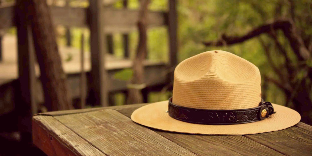 National Park Service Ranger Hat. The National Park Service hat band features leaves and the cone of the giant sequoia tree. Sequoia National Park is the second National Park established by law.