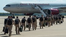 Barksdale Airmen board a plane to deploy from Barksdale Air Force Base, La., Sept. 10, 2016. More than 350 Barksdale Airmen deployed to Al Udeid Air Base, Qatar, from Sept. 6-10 in support of Operation Inherent Resolve. The mission of OIR is to defeat DA’ESH, the terrorist organization commonly referred to as ISIS, to increase regional stability. (U.S. Air Force photo/Senior Airman Curt Beach)