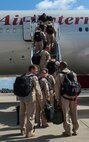 Barksdale Airmen board a plane to deploy to Al Udeid Air Base, Qatar, from Barksdale Air Force Base, La., Sept. 10, 2016. More than 350 Barksdale Airmen deployed to Al Udeid Air Base, Qatar, from Sept. 6-10 in support of Operation Inherent Resolve. The mission of OIR is to defeat DA’ESH, the terrorist organization commonly referred to as ISIS, to increase regional stability. (U.S. Air Force photo/Senior Airman Curt Beach)
