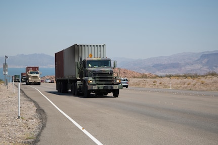 Soldiers with the 1221st Transportation Company make their way toward Hawthorne Army Depot, Nev., while hauling ammunition as part of Opertaion Patriot Bandoleer. (U.S. Army photo by Sgt. Mariah Best)