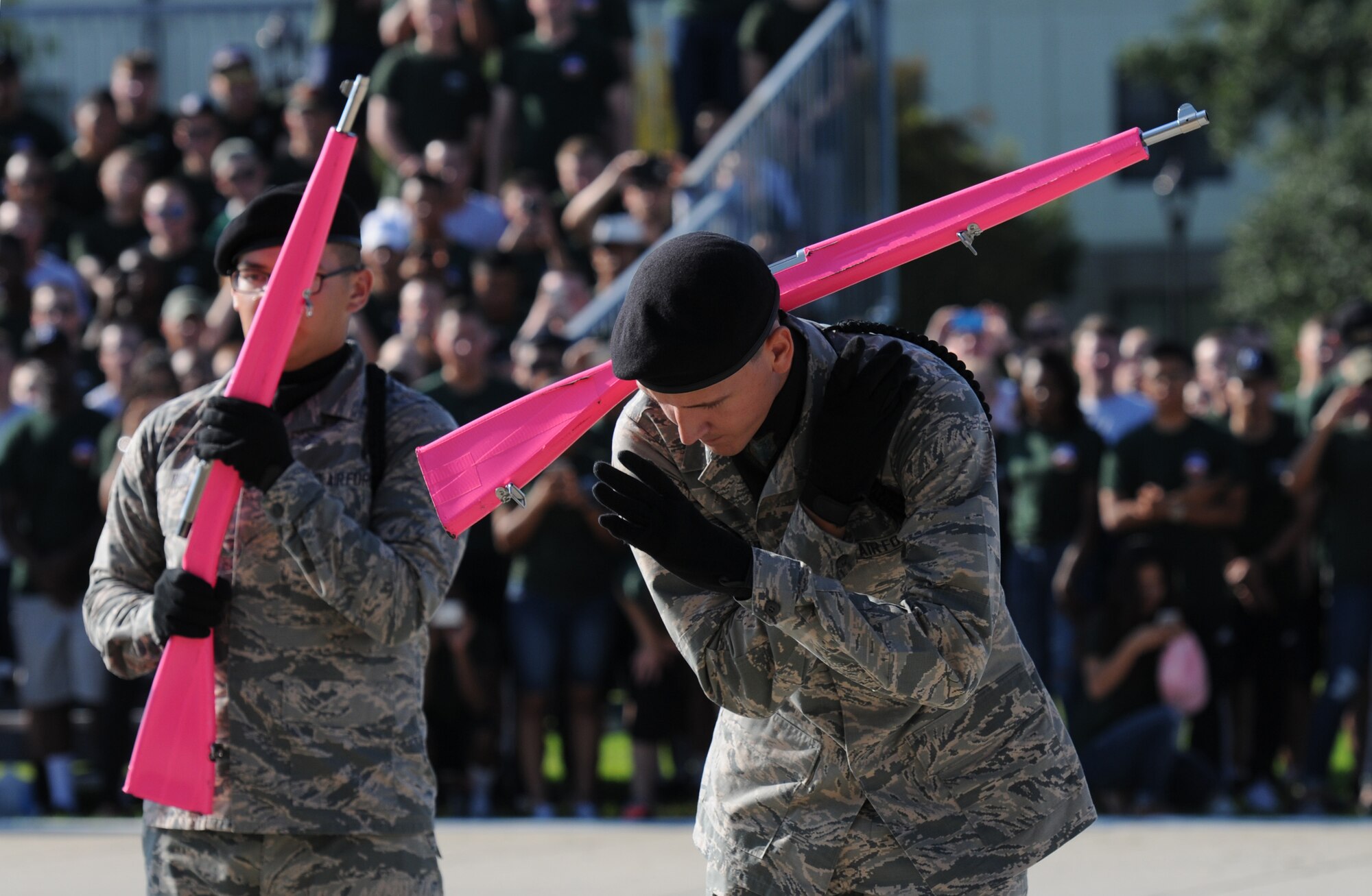 Airman 1st Class Kaleb Rios and Airman Basic Morgan Mayhew, 334th Training Squadron freestyle drill team members, perform during the 81st Training Group drill down at the Levitow Training Support Facility drill pad Sept. 9, 2016, on Keesler Air Force Base, Miss. The 334th TRS “Gators” placed first in open ranks, regulation and overall. (U.S. Air Force photo by Kemberly Groue/Released)