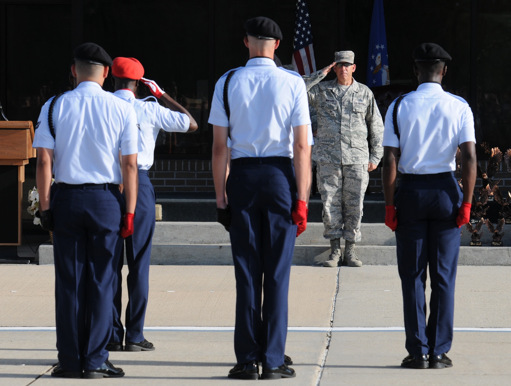 Chief Master Sgt. Robert Winters, 81st Training Group superintendent, renders a salute to the 336th Training Squadron regulation drill team during the 81st Training Group drill down at the Levitow Training Support Facility drill pad Sept. 9, 2016, Keesler Air Force Base, Miss. This was his last drill down as the 81st TRG superintendent before retiring with 29 years of service later that day. The 336th TRS “Red Wolves” placed first in freestyle and third in regulation and overall. (U.S. Air Force photo by Kemberly Groue/Released)