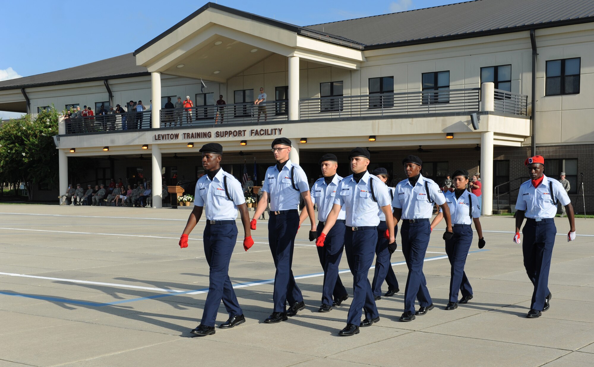 Members of the 336th Training Squadron regulation drill team perform during the 81st Training Group drill down at the Levitow Training Support Facility drill pad Sept. 9, 2016, on Keesler Air Force Base, Miss. The 336th TRS “Red Wolves” placed first in freestyle and third in regulation and overall. (U.S. Air Force photo by Kemberly Groue/Released)