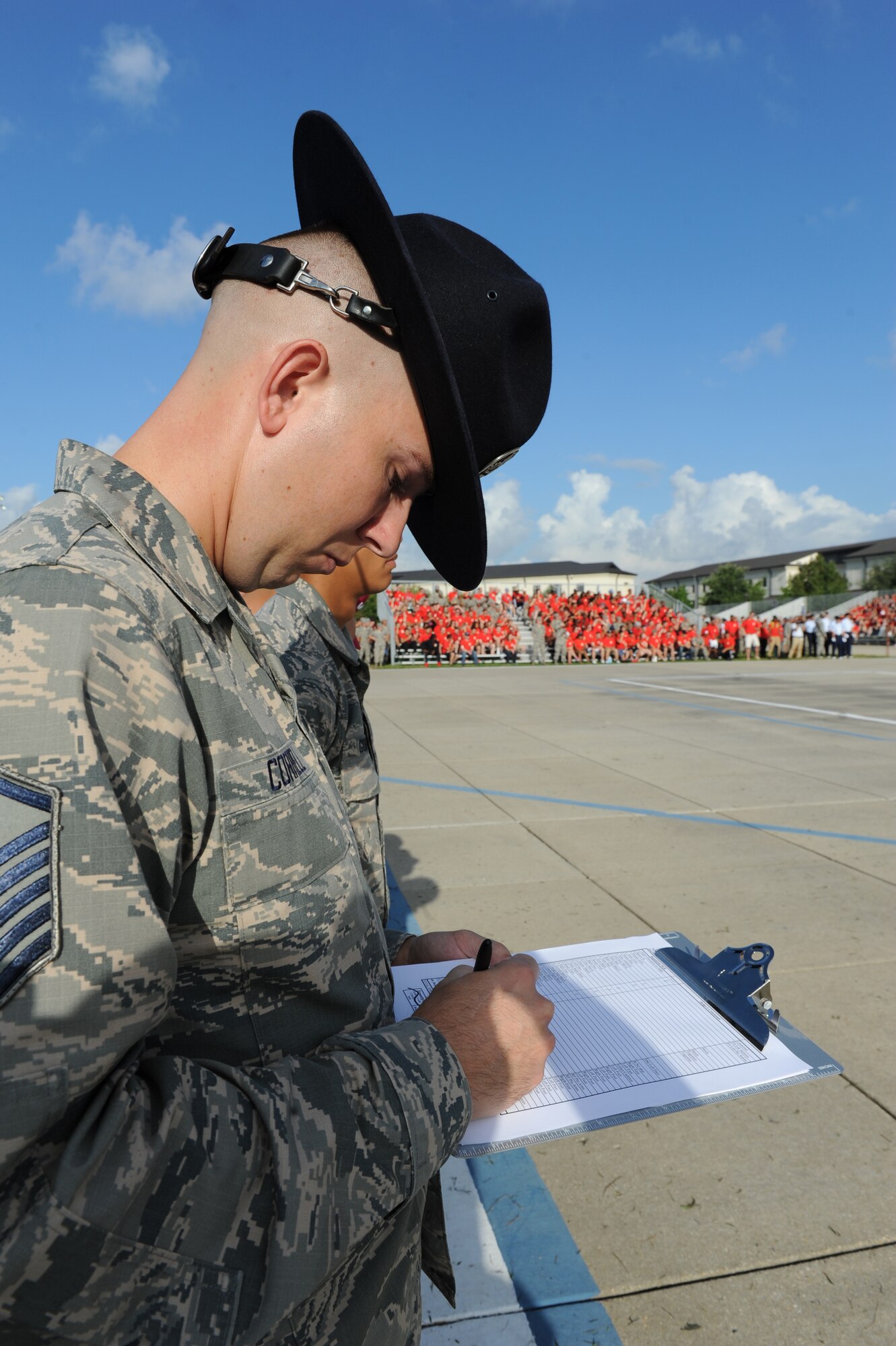 Master Sgt. James Correll, 2nd Air Force military training instructor, serves as a judge during the 81st Training Group drill down at the Levitow Training Support Facility drill pad Sept. 9, 2016, on Keesler Air Force Base, Miss. The 334th TRS “Gators” placed first in open ranks, regulation and overall. (U.S. Air Force photo by Kemberly Groue/Released)