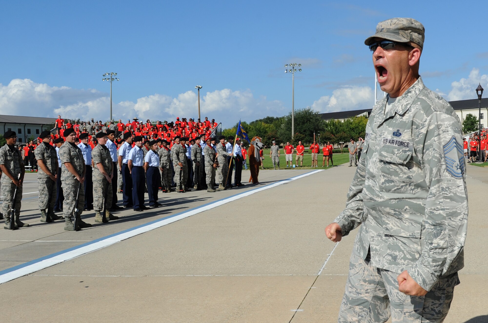 Chief Master Sgt. Robert Winters, 81st Training Group superintendent, yells a chant during the 81st Training Group drill down at the Levitow Training Support Facility drill pad Sept. 9, 2016, on Keesler Air Force Base, Miss. This was his last drill down as the 81st TRG superintendent before retiring with 29 years of service. The 334th TRS “Gators” placed first in open ranks, regulation and overall. (U.S. Air Force photo by Kemberly Groue/Released)