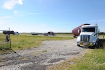 A de-icing tank is parked on the McConnell Air Force Base, Kan., flightline, Sept. 12, 2015, before being lowered to its final stop. The tanks will be able to accommodate both the KC-135 Stratotanker and the KC-46 Pegasus in order to keep the base aerial refueling mission going during freezing temperatures. (U.S. Air Force photo/Senior Airman David Bernal Del Agua)