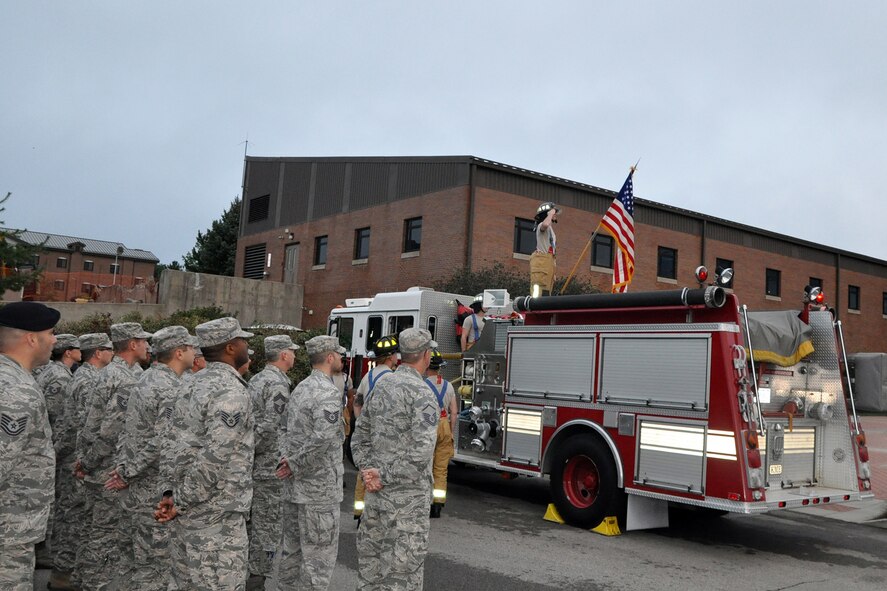 Members of the 910th Airlift Wing attend a 9/11 rememberance ceremony commemorating the 15th anniverasary of the terroist attacks on the World Trade Center and Pentagon. The ceremony was held here, Sept. 11, 2016. (U.S. Air Force photo/Master Sgt. Bob Barko Jr.)