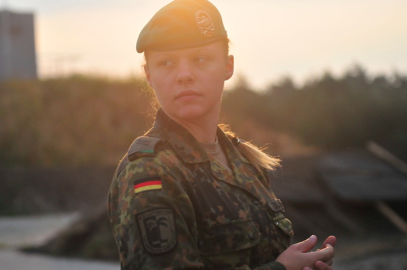 A female mechanized infantry soldier of the 4th Company, 33rd Mechanized Infantry Batallion, takes pause while on the Puma Live-Fire Range in Bergen, Germany Sept. 31.  (U.S. Army Reserve photo by Capt. Xeriqua Garfinkel, Released)