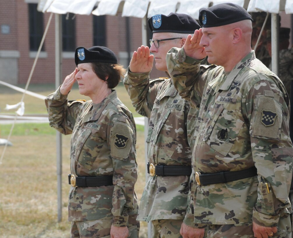 Maj. Gen. Peter S. Lennon, deputy commanding general (Support), U.S. Army Reserve Command (center), officiates a change-of-command ceremony Sept. 10 between the 99th Regional Support Command’s outgoing commander, Maj. Gen. Margaret W. Boor (left), and incoming commander, Brig. Gen. (P) Troy D. Kok (right), outside command headquarters on Joint Base McGuire-Dix-Lakehurst, New Jersey.