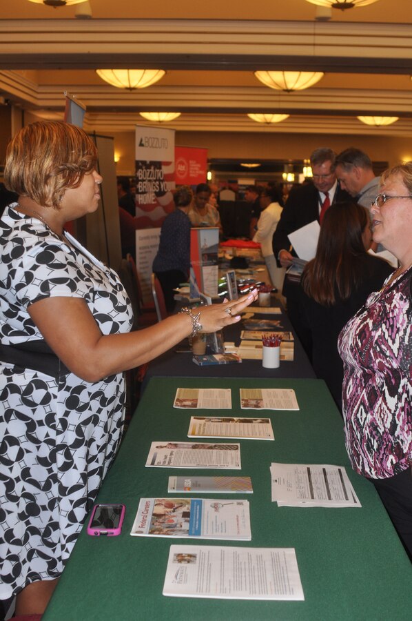 Recruiters talk to job applicants at the Hiring Our Heroes Job Fair held Sept. 8 at The Clubs at Quantico.  The fair was held so companies could tap into the pool of service members, veterans and spouses.