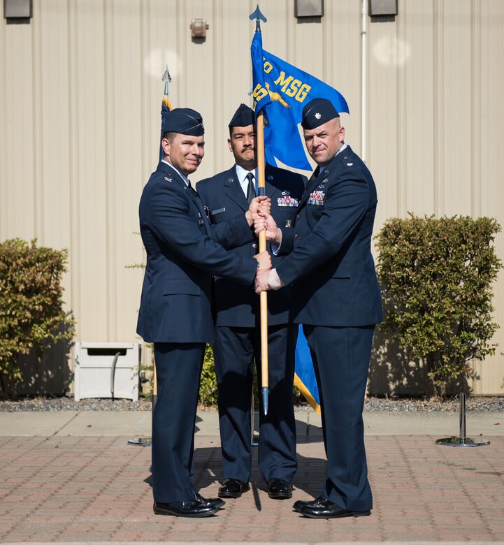 Lt. Col. Bradley G. King, 940th Civil Engineer Squadron commander, receives the squadron guidon from Col. Roderick T. Grunwald, 940th Mission Support Group commander, during the 940 CES assumption of command ceremony Sept. 11, 2016, at Beale Air Force Base, California. The 940 CES provides reserve emergency response and firefighting capabilities to augment the base civil engineering mission. (U.S. Air Force photo by Staff Sgt. Brenda Davis)