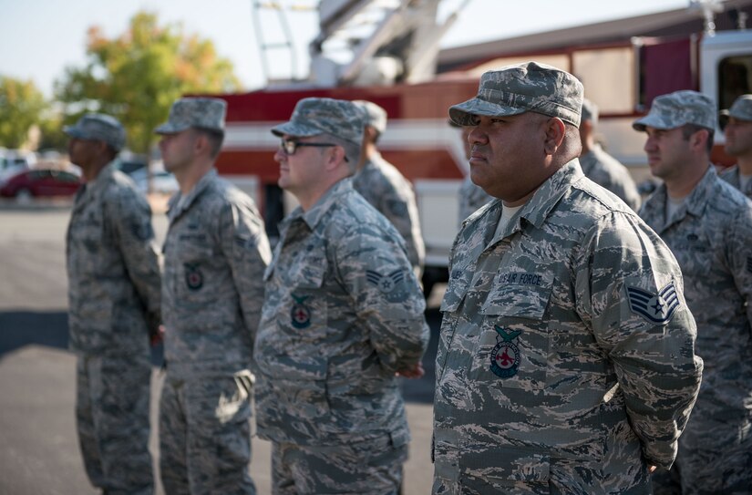 Firefighters with the 940th Civil Engineer Squadron watch an assumption of command ceremony Sept. 11, 2016, at Beale Air Force Base, California. The ceremony represented the first civil engineer squadron startup in over 20 years for Air Force Reserve Command. (U.S. Air Force photo by Staff Sgt. Brenda Davis)