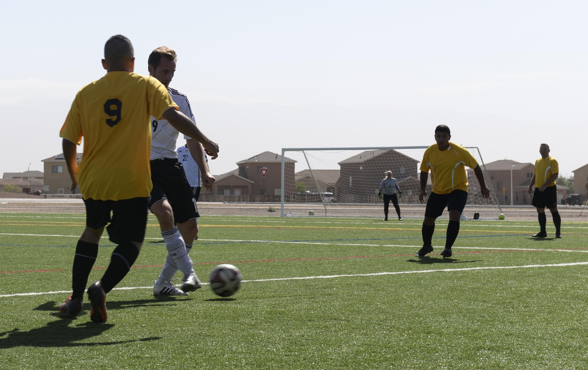 Soccer players from both the U.S. and German air forces compete during the annual soccer match at Holloman Air Force Base, N.M. on Sept. 10, 2016. Each year prior to the Oktoberfest, Holloman Airmen and the German air force compete in a friendly match to showcase their athletic abilities on the soccer field. (U.S. Air Force photo by Airman Alexis P. Docherty) 