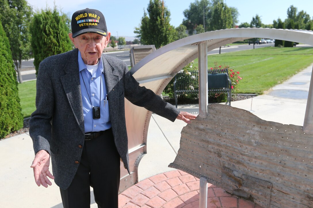 World War II veteran Mr. Joe Rolison, husband to Lt. David R. Kingsley’s late sister Phyllis, remembers traveling to Suhozem, Bulgaria and finding this piece of wreckage displayed in the memorial at the entrance to Kingsley Field Air Base in Klamath Falls, Oregon, Aug. 31, 2016. Rolison visited the base to share his stories and a number of historic items of Kingsley’s including his journal kept during WWII. (U.S. Air National Guard photo by Tech. Sgt. Jefferson Thompson)