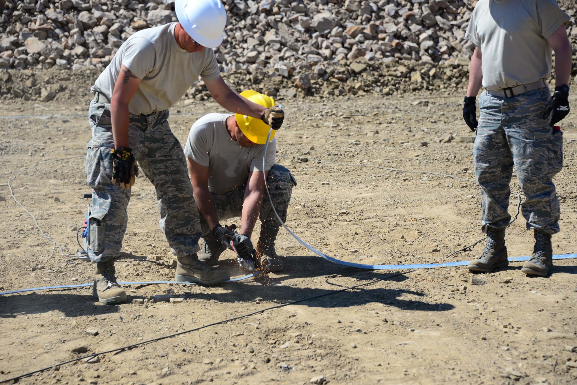 Airmen from the 118th Mission Support Group, Tennessee Air National Guard, construct lightening protection grid work for the Ammo Holding Area, better known as the AHA, Aug. 16, 2016, at Novo Selo Training Area, Bulgaria.  Tennessee National Guard Soldiers and Airmen were on rotations to complete thier portions of projects as part of Operation Resolute Castle 16, an ongoing operation of military construction to build up Eastern European base infrastructure and help strengthen ties between Tennessee's state partnership with Bulgaria. (U.S. Air National Guard photo by Master Sgt. Kendra M. Owenby, 134 ARW Public Affairs)