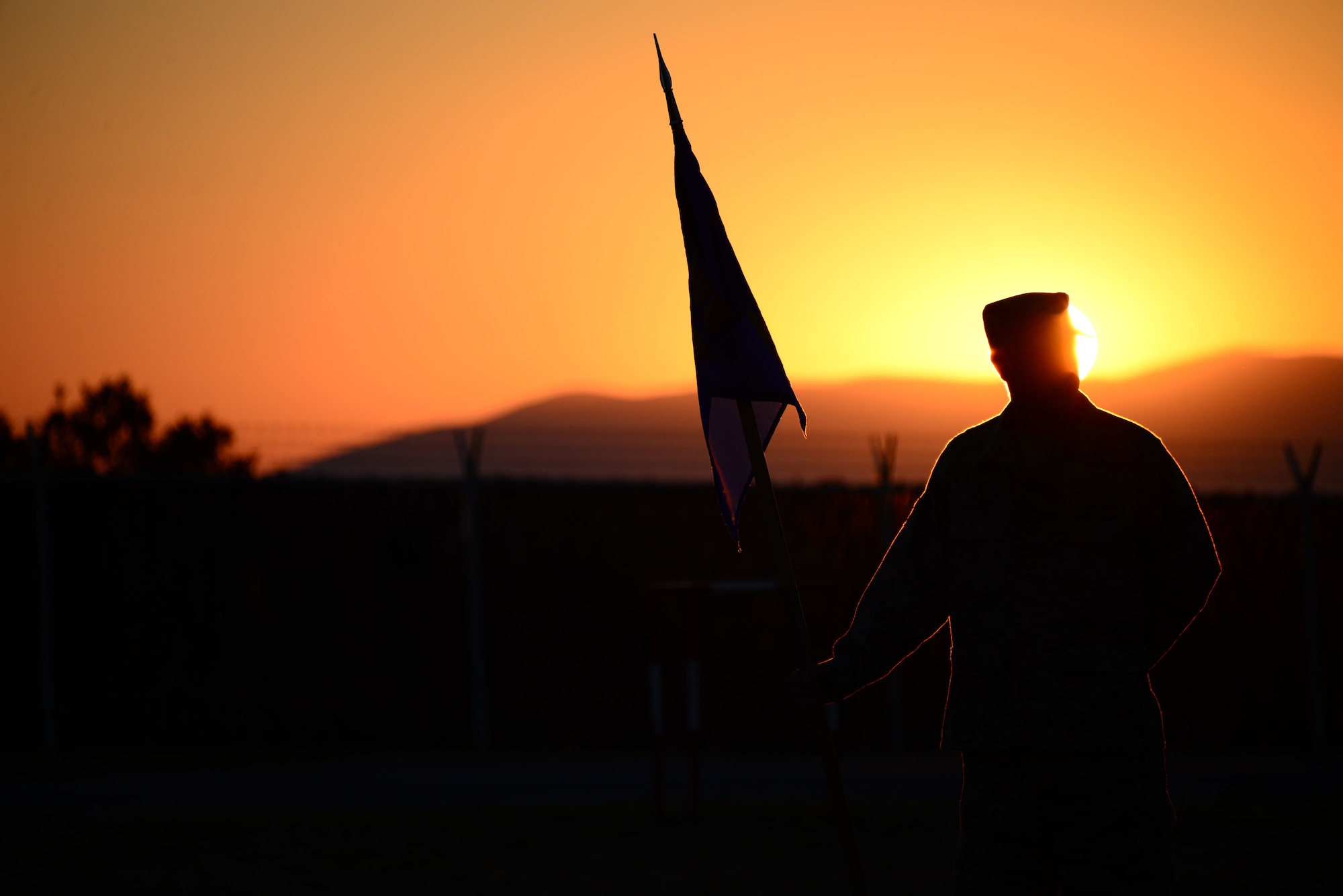 Staff Sgt. Zack Allen, 118th Mission Support Group, Tennessee Air National Guard, stands at parade rest during an early formation Aug. 15, 2016, while deployed to Novo Selo Training Area, Bulgaria.  Tennessee National Guard Soldiers and Airmen were on rotations to complete thier portions of projects as part of Operation Resolute Castle 16, an ongoing operation of military construction to build up Eastern European base infrastructure and help strengthen ties between Tennessee's state partnership with Bulgaria. (U.S. Air National Guard photo by Master Sgt. Kendra M. Owenby, 134 ARW Public Affairs)
