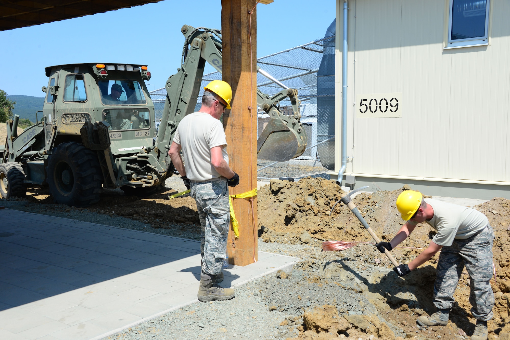Airmen from the 118th Civil Engineer Squadron, Tennessee Air National Guard, install lightening protection at a pavilion Aug. 10, 2016, at Novo Selo Training Area, Bulgaria.  Tennessee National Guard Soldiers and Airmen were on rotations to complete thier portions of projects as part of Operation Resolute Castle 16, an ongoing operation of military construction to build up Eastern European base infrastructure and help strengthen ties between Tennessee's state partnership with Bulgaria. (U.S. Air National Guard photo by Master Sgt. Kendra M. Owenby, 134 ARW Public Affairs)